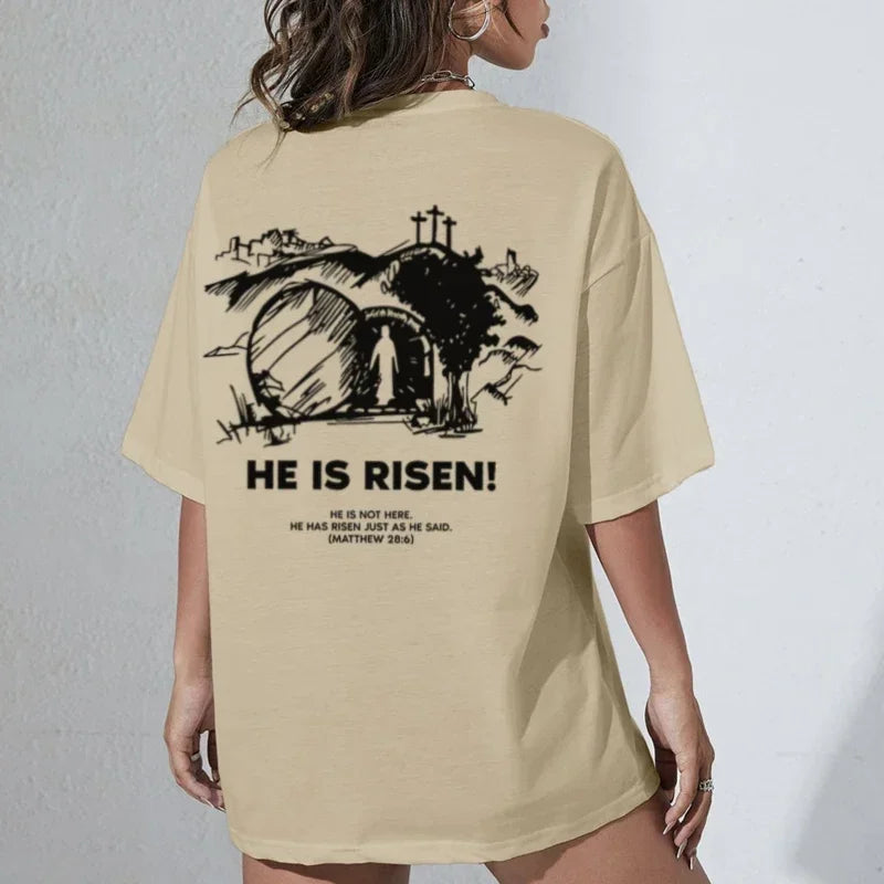 Christian Easter t-shirt with 'He is Risen!' graphic on back, celebrating the true meaning of Easter.